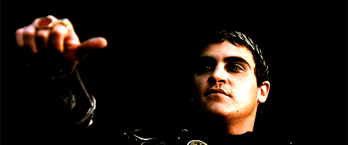 joaquin phoenix thumbs down gif | WiffleGif